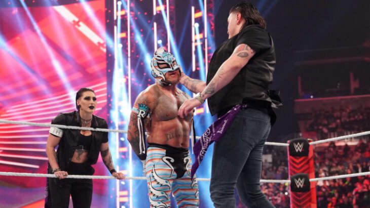 Rey and Dominik Mysterio face off in a NASCAR event