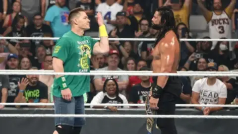 JOHN CENA AND ROMAN REIGNS