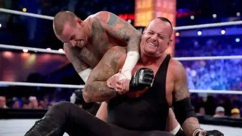 The Undertaker Wants WWE to Do Something Big for CM Punk