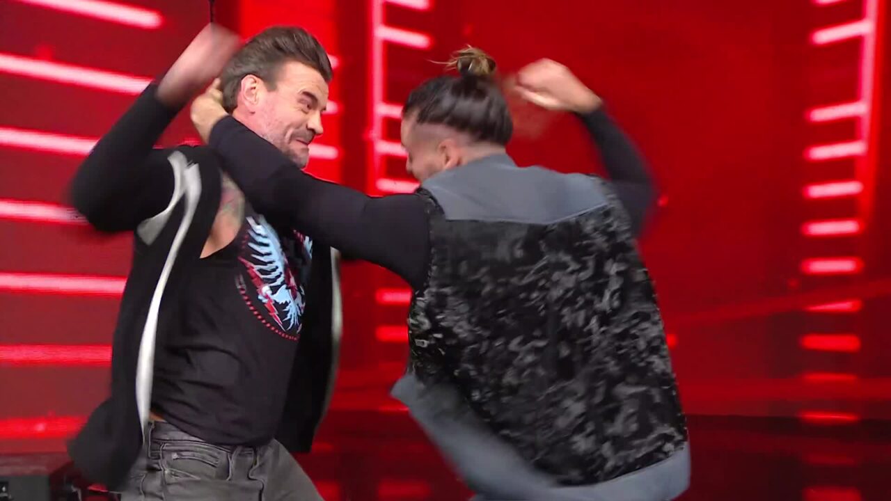 WWE Confirms CM Punk vs. Seth Rollins in a Steel Cage Match