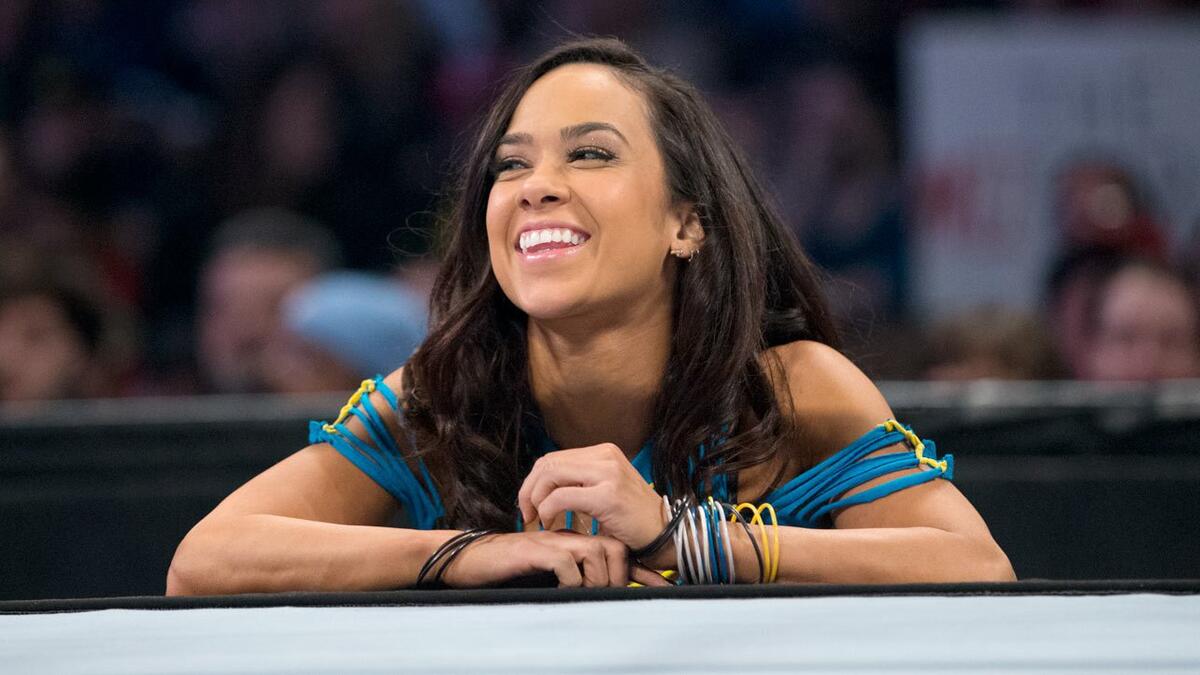 AJ Lee Responds After Roxanne Perez Attacks CM Punk At WWE Live Event